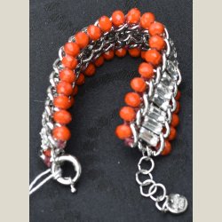 Kaiser Coral armbnd i orange og slv. Nyt.