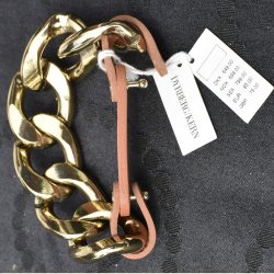 Guldarmbnd med Lysbrunt lderspnde, nyt. Nypris er 649kr.