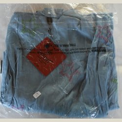 Blt bomuldstrklde med store stjerner. Ml 62 x 200cm.